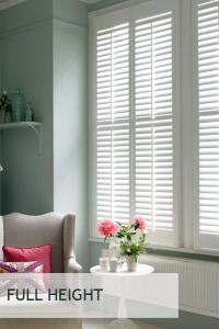 full height white shutters in lounge